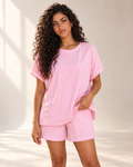 Blushenne Blush Pink Lounge Tee and Shorts Set in an ivory studio