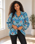 Blushenne Frill Balloon-Sleeve Blouse worn by a photorealistic adult fashion model with natural skin texture