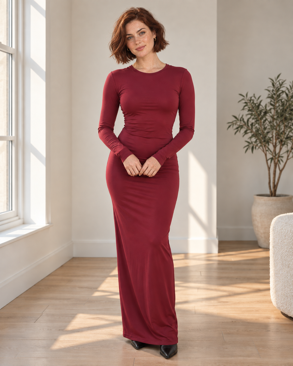 Blushenne Sleek Long-Sleeve Bodycon Maxi Dress on a distinct photorealistic fashion model