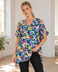 Blushenne Printed V-Neck Side-Slit Top on a distinct photorealistic fashion model
